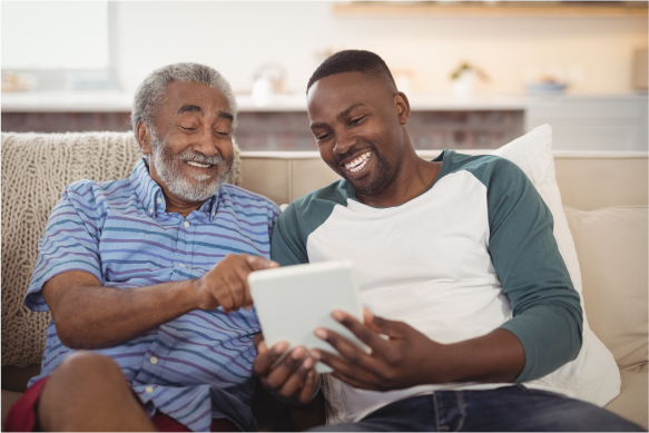 Happy people looking at iPad